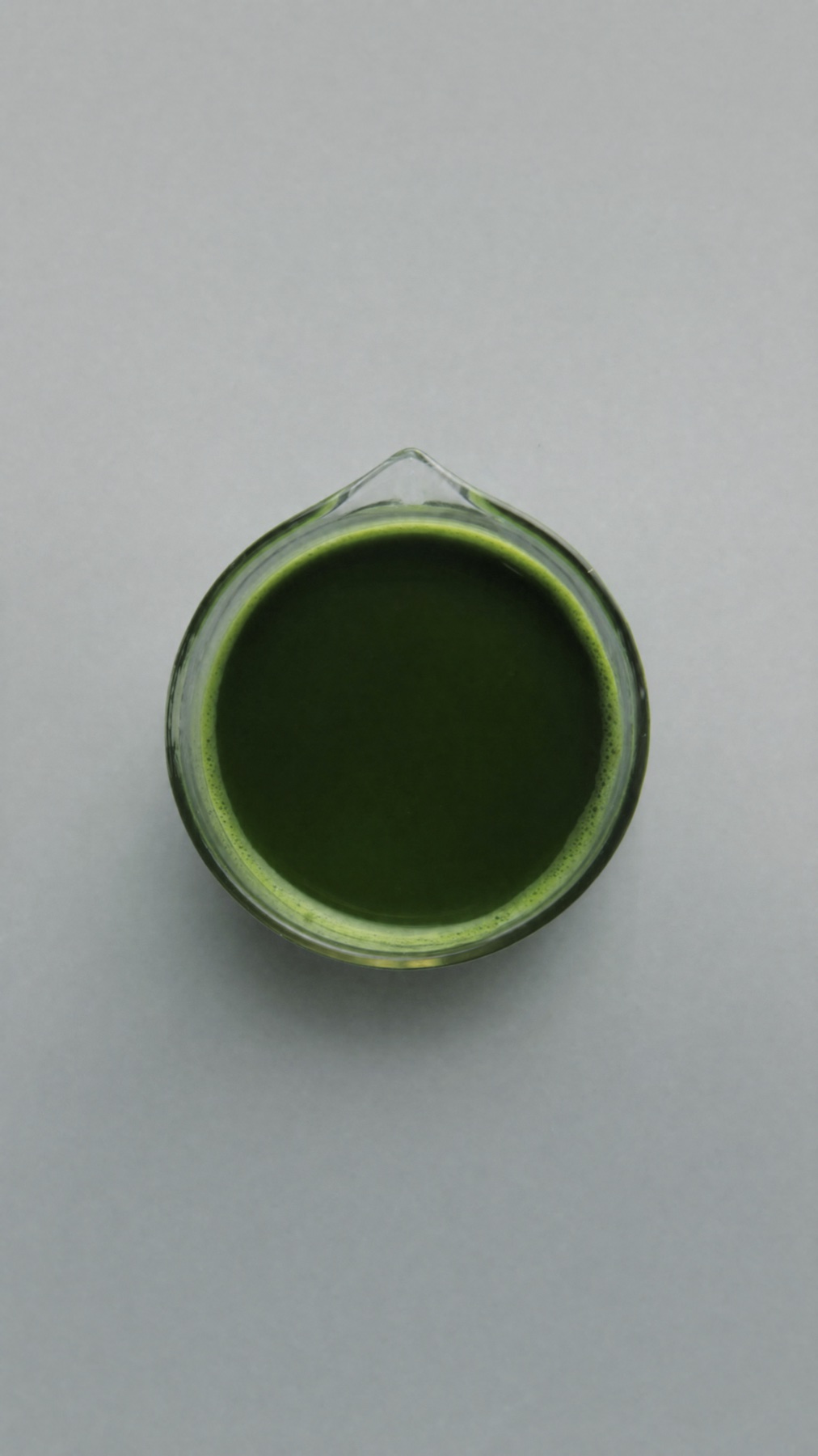 Top-down view of a bowl of freshly whisked Hisa matcha